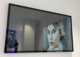 65-inch wall-mounted LCD advertising player for brand store, Italy